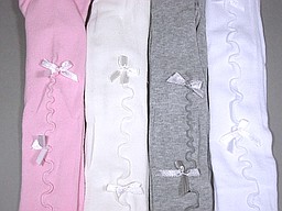 Baby maillots met strikjes in lichte kleuren Baby maillots met strikjes in lichte kleuren