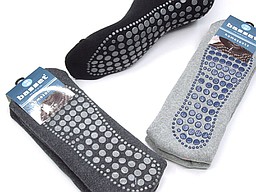 Effen herensokken met anti slip in zwart en grijs Effen herensokken met anti slip in zwart en grijs